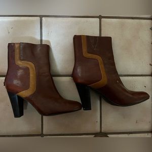 Brown and tan heeled dress boots. Worn once; size 8.